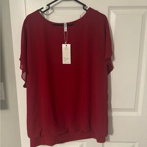 Red sheer blouse. New with tags.